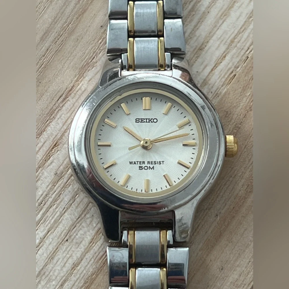 Seiko Ladies Watch Spiral Stainless Dial Gold-Tone Markers Two-Tone Bracelet